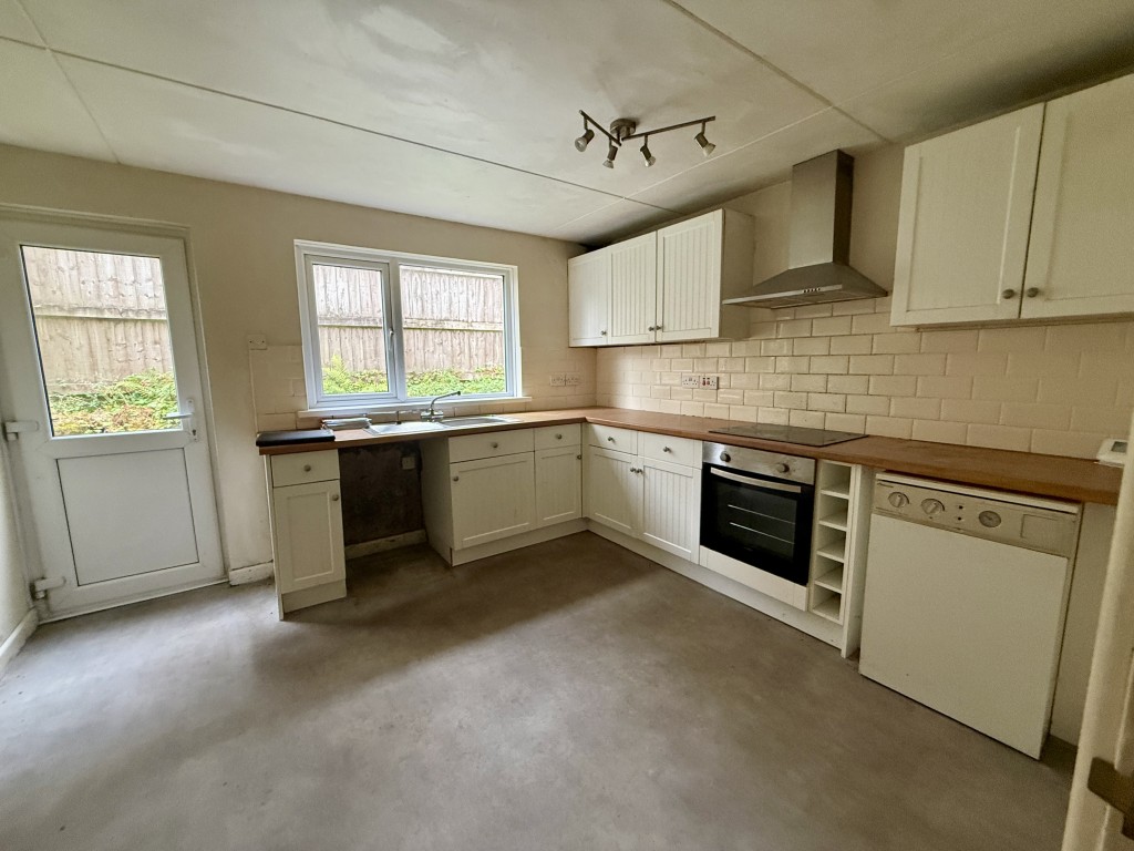 Lot: 182 - SEMI-DETACHED COTTAGE FOR UPDATING - Kitchen photo with rear door